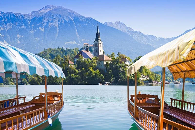 Lake Bled wooden boat 800 | Solo Travel For Women | Sisterhood Travels Group Tours