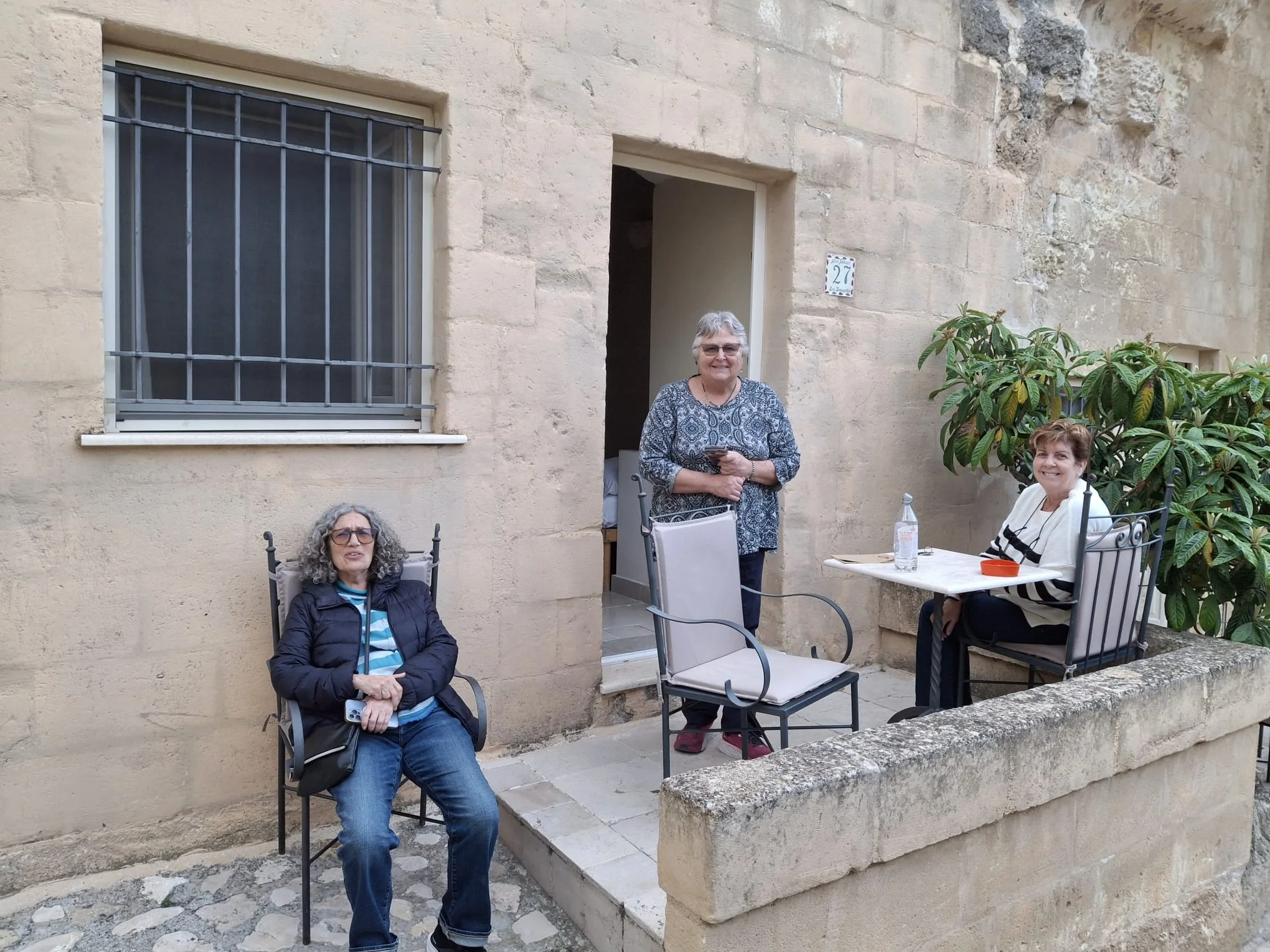 women outside a building a part of a woman only travel group
