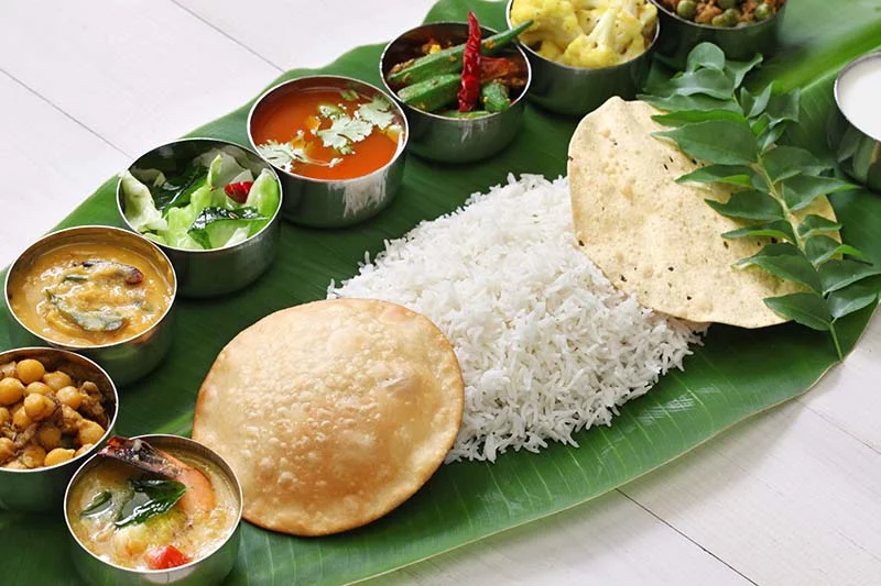 South Indian cuisine banana leaf 2 | Solo Travel For Women | Sisterhood Travels Group Tours