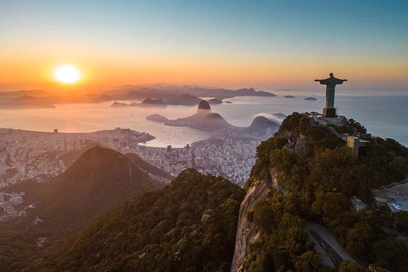 Christ the Redeemer above Rio de Janeiro at golden sunrise