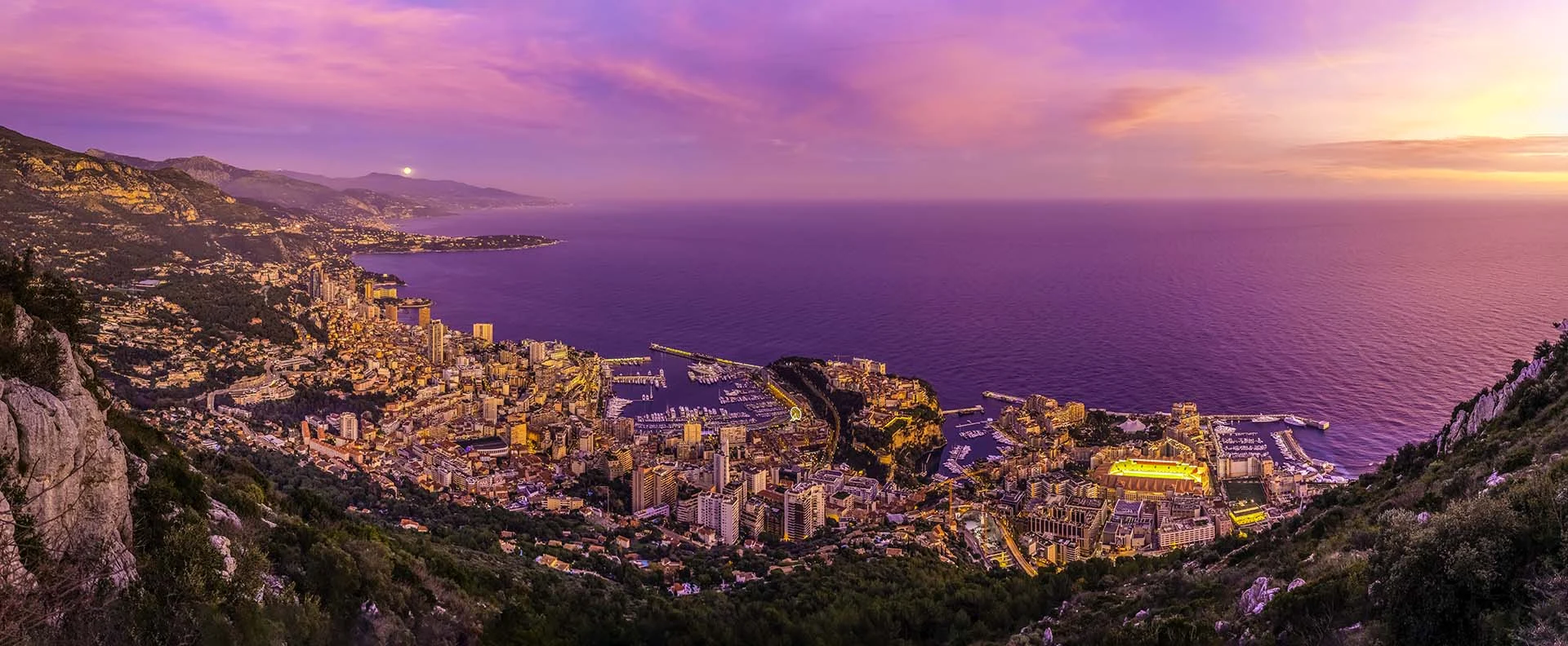 FRENCH RIVIERA WITH THE SISTERHOOD 2027 4 Vibrant sunset over Monaco coastline.