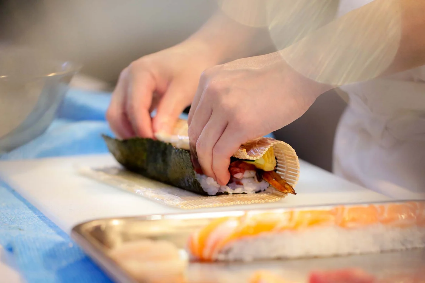 Heart of Japan 2028 17 sushi making 1400 | Solo Travel For Women | Sisterhood Travels Group Tours