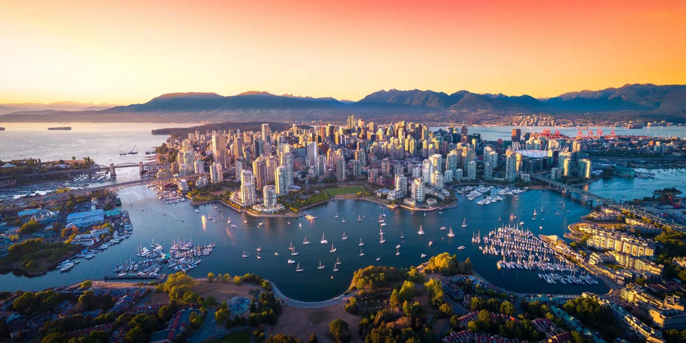 Canadian Rockies Luxury Rail Journey 2027 8 vancouver skyline welcome 1400 | Solo Travel For Women | Sisterhood Travels Group Tours